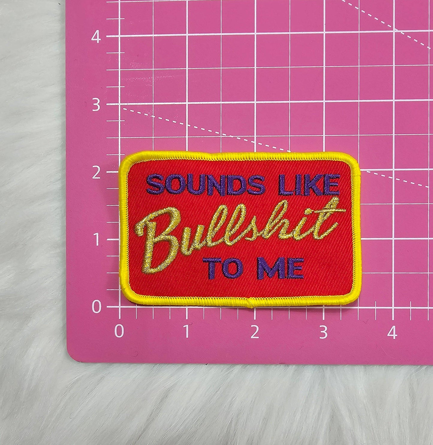 Patch - 'Sounds Like Bullshit To Me' Red, Yellow and Purple Woven Embroidery Iron On Patch